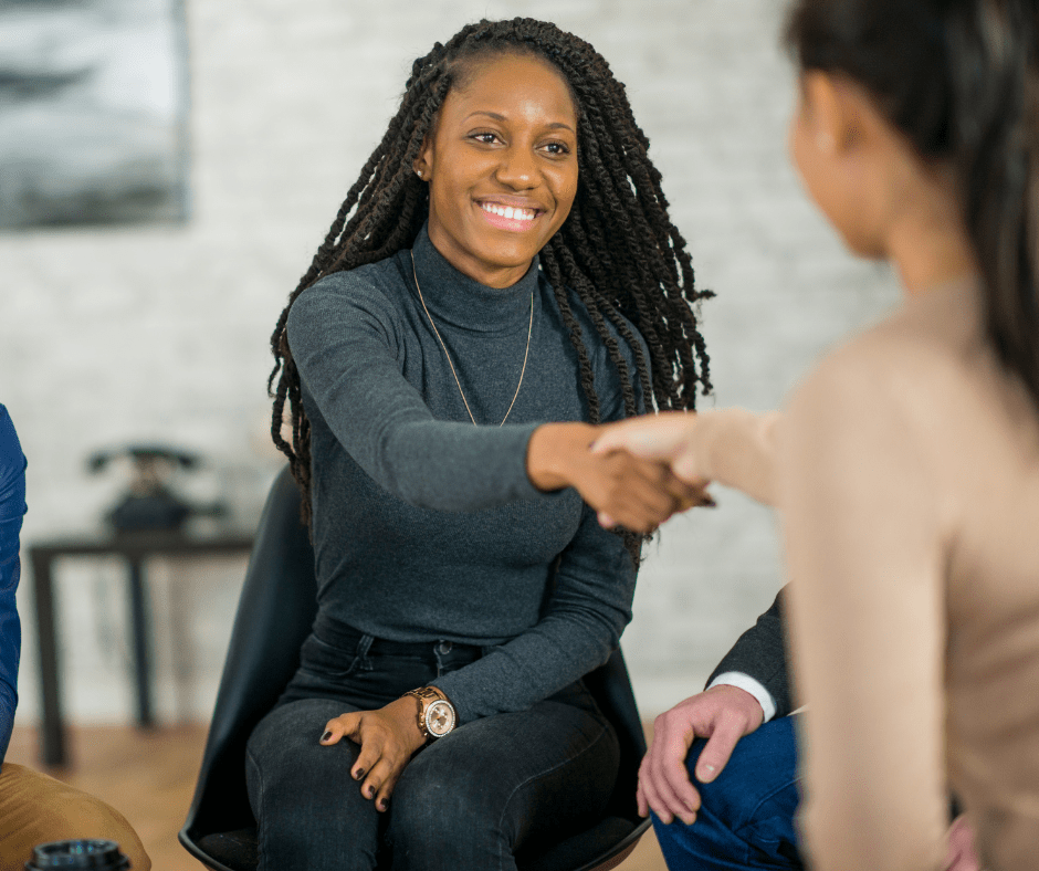 women shaking hands