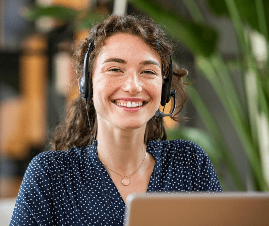 woman smiling with headset on