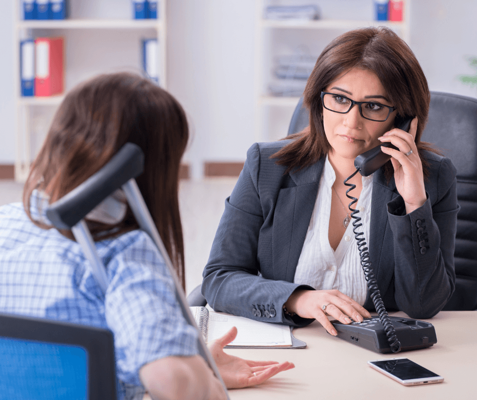 lawyer talking to client and using phone